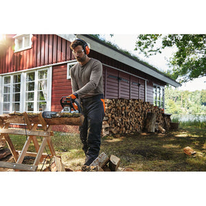 Person using STIHL MS 182 PETROL CHAINSAW